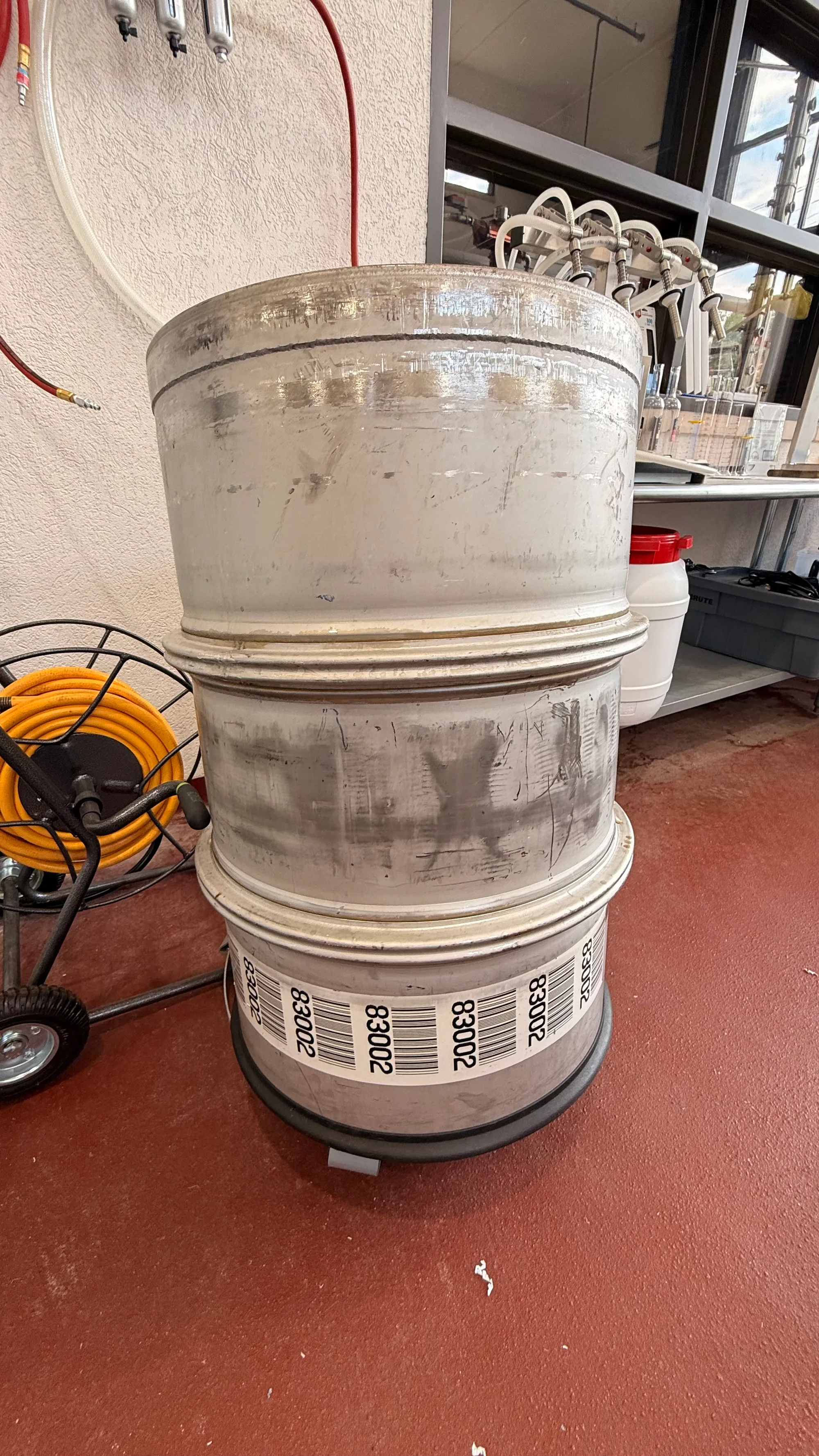 Stainless steel drums with valve and casters