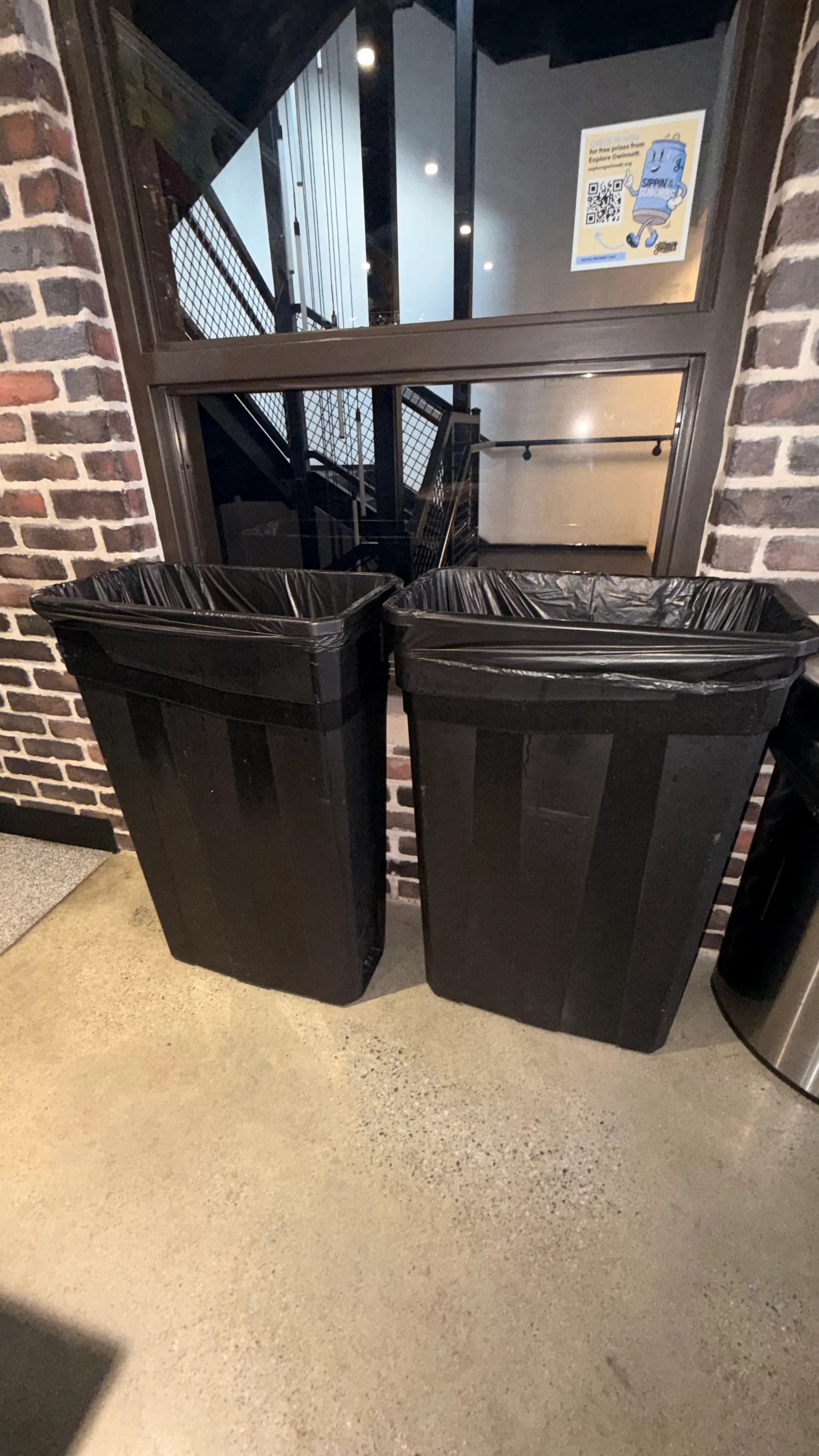 Black trash cans