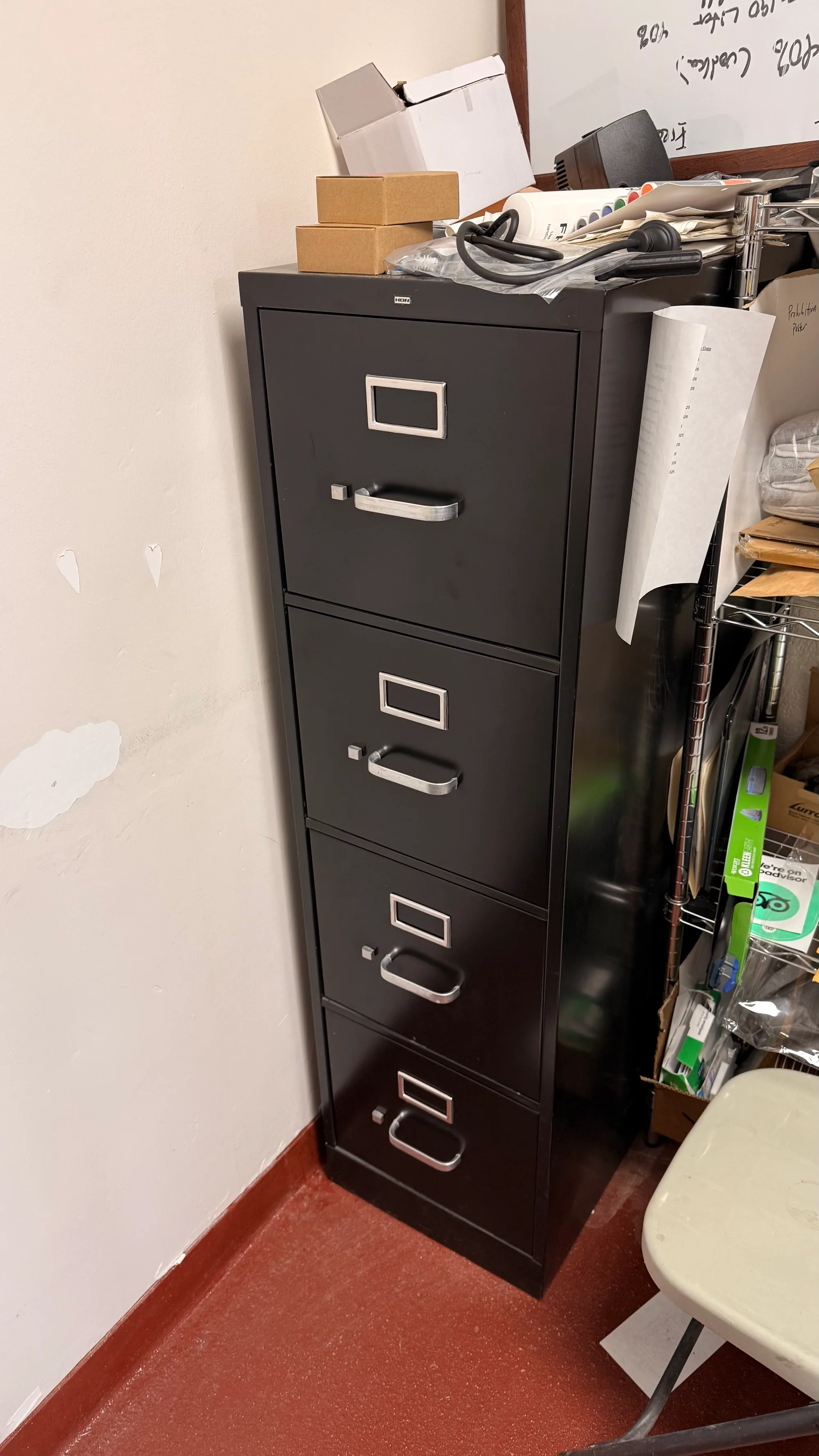 Black 4-drawer metal filing cabinet