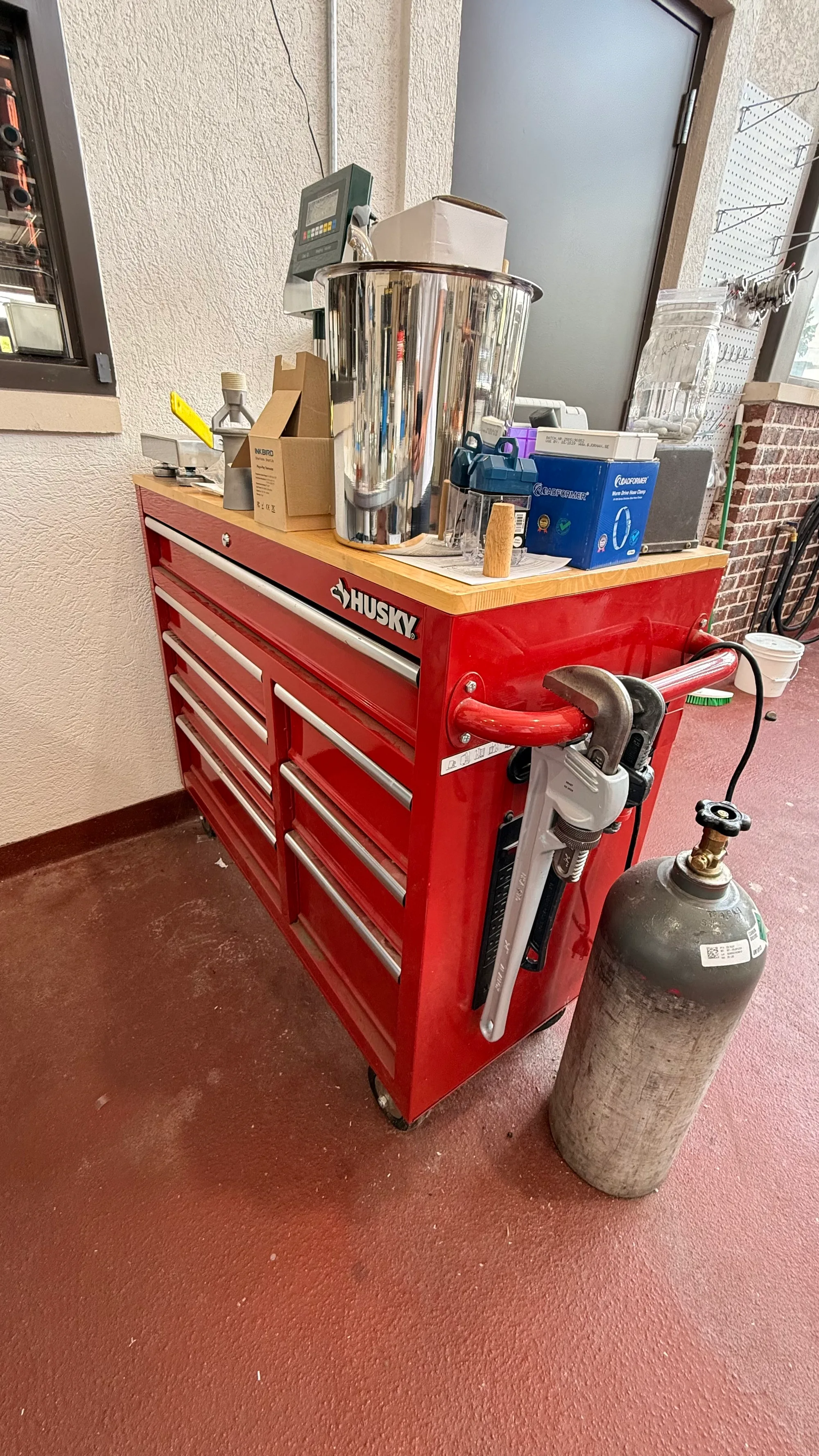 Husky 9-drawer mobile workbench with wood top (red)